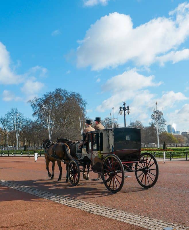 A royal carriage outside Buckingham Palace