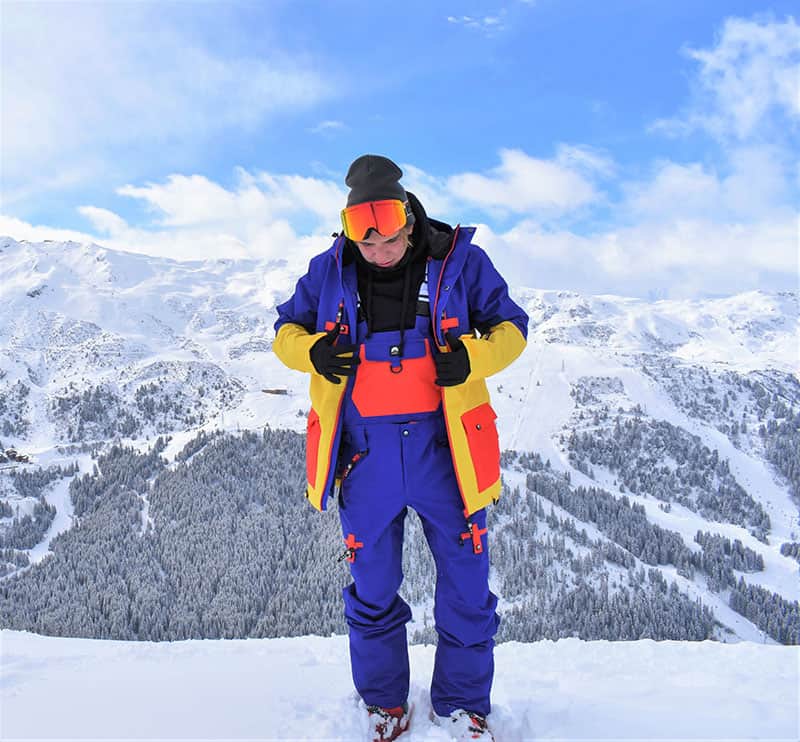 A colorful ski jacket and bib by OOSC Clothing