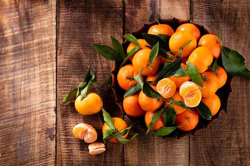 Fresh mandarin oranges with leaves