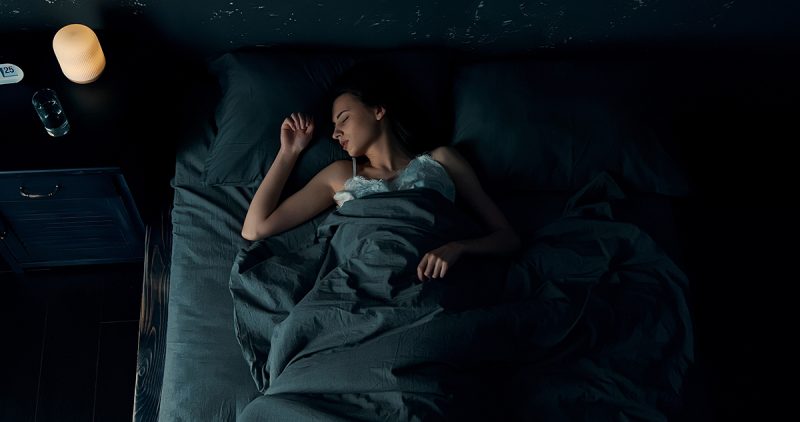 A woman sleeping at night