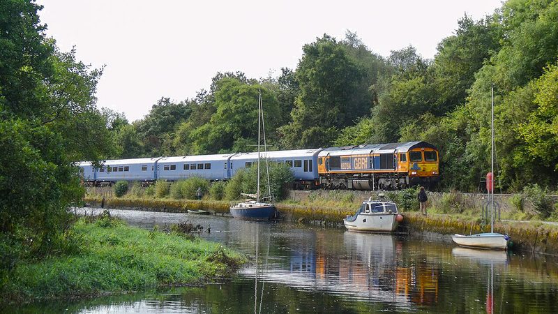 Belmond Britannic Explorer beside the river Fowey, Cornwall